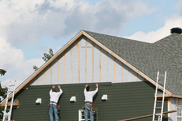 Professional Siding Contractor technician working in Smithville, NJ